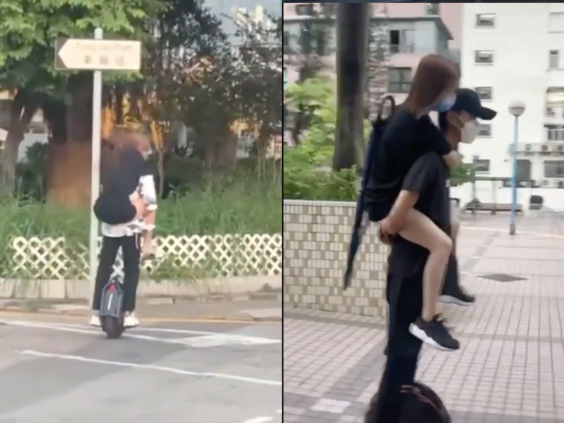 孭住個女仔玩電動單輪車出馬路