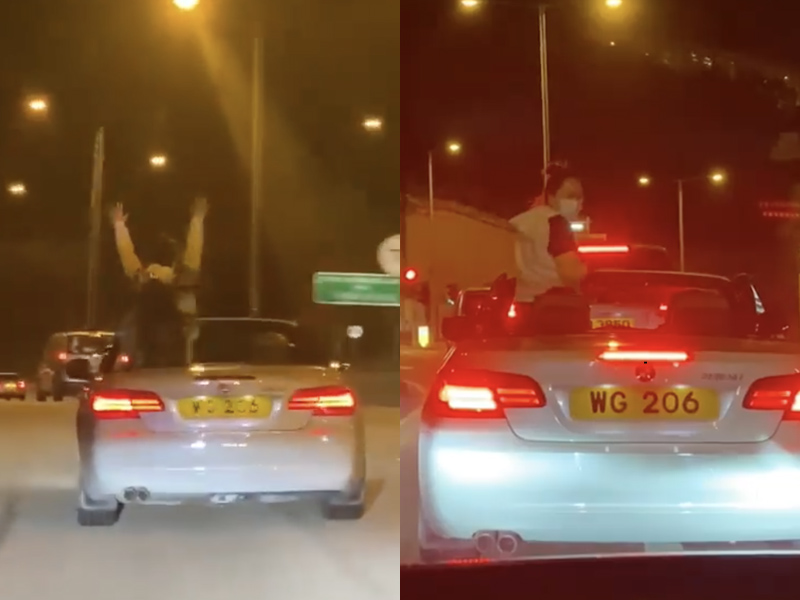 美女寶馬開篷車好興奮 忘我企起身吹風揮手 美女寶馬開篷車好興奮 忘我企起身吹風揮手